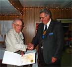 Thumbnail: Russell Ontario Lion Don Graham receiving International President Clem Kusiak’s Certificate of Appreciation